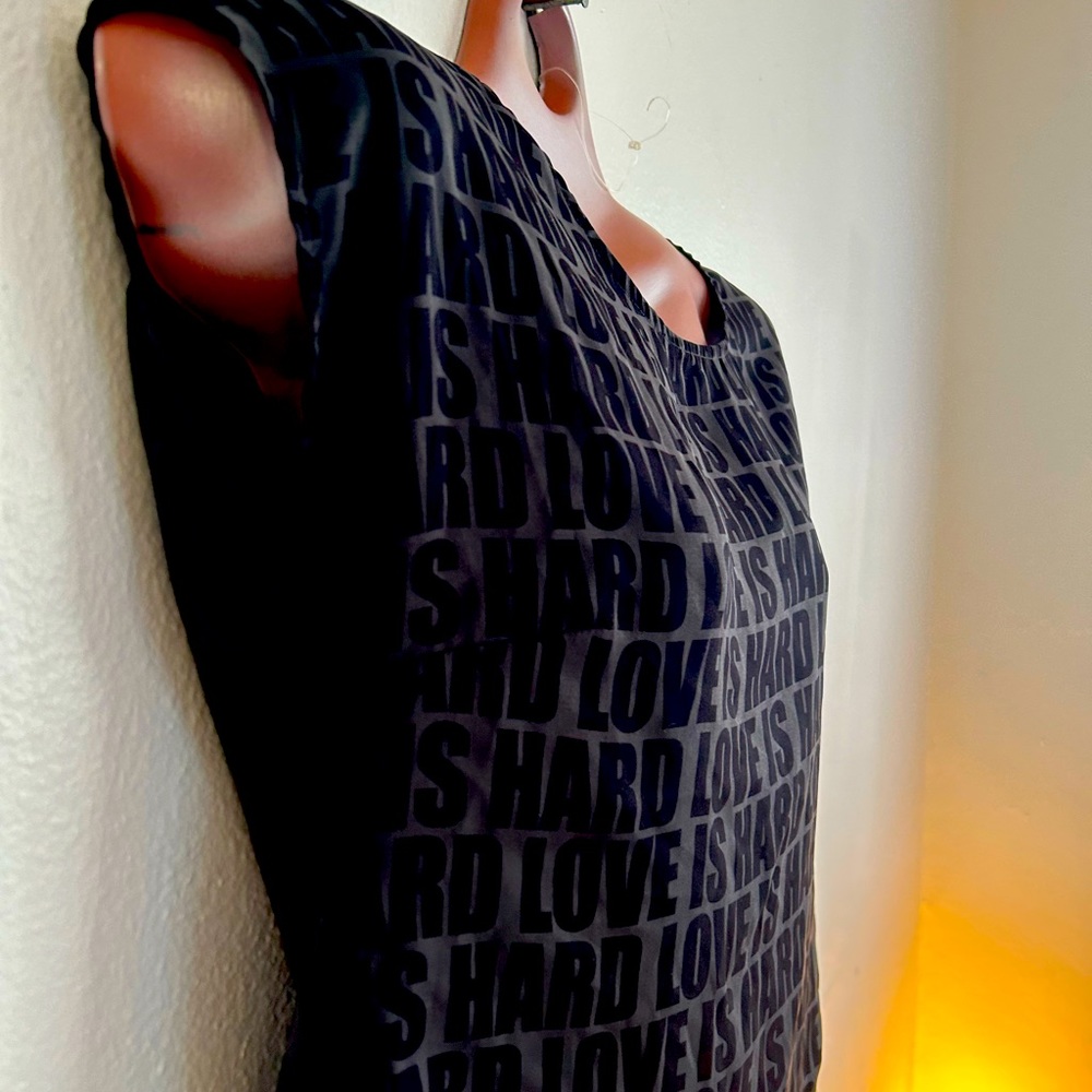 Black and Grey sleeveless blouse with buttons up the back